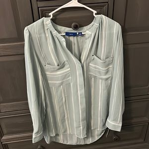 Woman’s green and white dress top